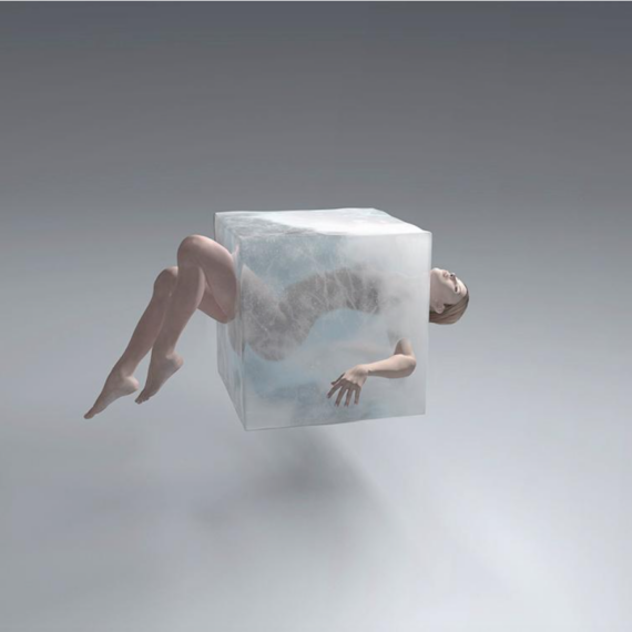Un client dans une cryochambre de -100°C, vêtu de gants et de protections, entouré d’une brume froide.